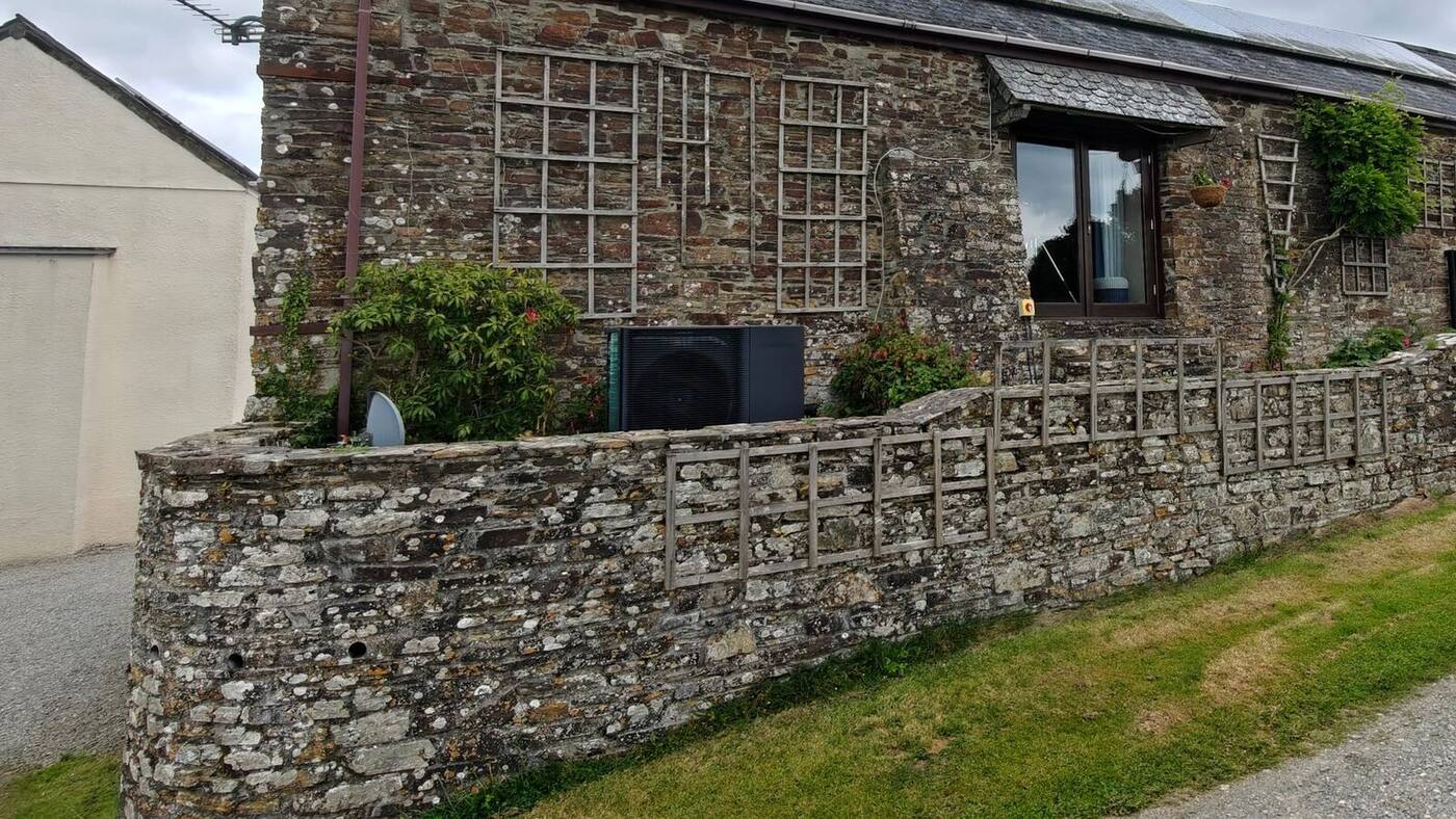 Heat pump installation at a stone cottage